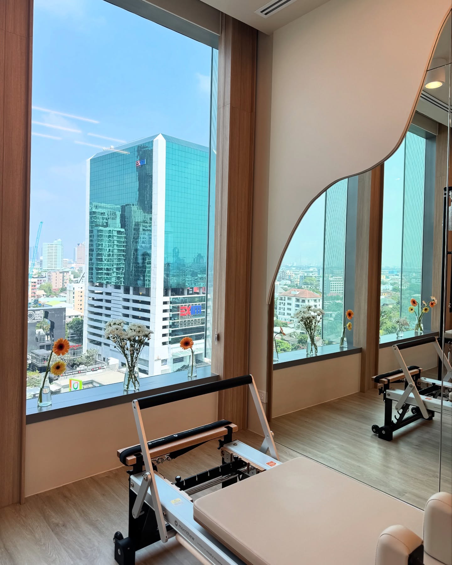 Reformer studio with city view